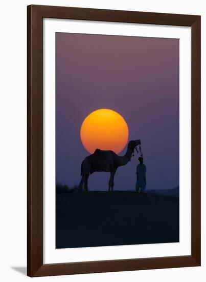 Camel and person at sunset, Thar Desert, Rajasthan, India-Art Wolfe-Framed Photographic Print