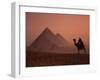 Camel and Rider at Giza Pyramids, UNESCO World Heritage Site, Giza, Cairo, Egypt-Howell Michael-Framed Photographic Print