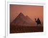 Camel and Rider at Giza Pyramids, UNESCO World Heritage Site, Giza, Cairo, Egypt-Howell Michael-Framed Photographic Print