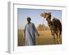 Camel Driver Stands in Front of the Pyramids at Giza, Egypt-Julian Love-Framed Photographic Print