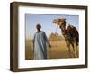 Camel Driver Stands in Front of the Pyramids at Giza, Egypt-Julian Love-Framed Photographic Print