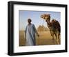 Camel Driver Stands in Front of the Pyramids at Giza, Egypt-Julian Love-Framed Photographic Print
