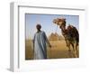 Camel Driver Stands in Front of the Pyramids at Giza, Egypt-Julian Love-Framed Photographic Print