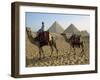 Camels and Rider at the Giza Pyramids, UNESCO World Heritage Site, Giza, Cairo, Egypt-Dominic Harcourt-webster-Framed Photographic Print