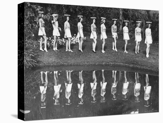 Camera Models at Cypress Gardens, Walking with Blocks on Their Heads For Balance and Posture-Bernard Hoffman-Stretched Canvas