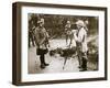 Cameraman filming a wounded soldier, Somme campaign, France, World War I, 1916-Unknown-Framed Photographic Print