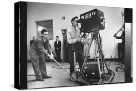 Cameraman Nick Luppino Honing in TV Camera During 1st Broadcast at Newly Opened WICV-TV Station-Ralph Morse-Stretched Canvas