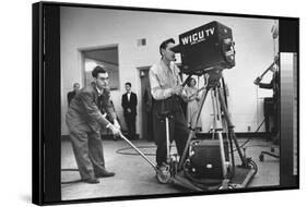 Cameraman Nick Luppino Honing in TV Camera During 1st Broadcast at Newly Opened WICV-TV Station-Ralph Morse-Framed Stretched Canvas