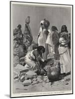 Campaigning in Somaliland, Native Women Drawing Water from a Well for the Troops-Frederic De Haenen-Mounted Giclee Print