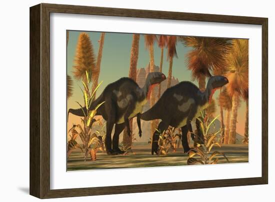 Camptosaurus Dinosaurs Wander Through a Prehistoric Jungle-null-Framed Art Print