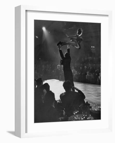 Can Can Dancer Held Up in the Air by a Performing Gentleman at the Paris Show-Nat Farbman-Framed Photographic Print