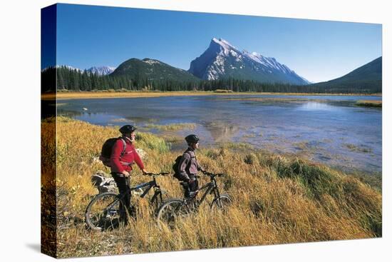 Canada, Alberta, Banff National Park, Vermilion Lake, Tourists with Bikes-null-Stretched Canvas