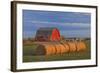 Canada, Alberta, Grande Prairie. Red Barn and Hay Bales at Sunset-Jaynes Gallery-Framed Photographic Print