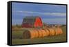 Canada, Alberta, Grande Prairie. Red Barn and Hay Bales at Sunset-Jaynes Gallery-Framed Stretched Canvas