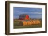 Canada, Alberta, Grande Prairie. Red Barn and Hay Bales at Sunset-Jaynes Gallery-Framed Photographic Print