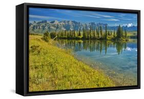 Canada, Alberta, Jasper National Park. Mountains and trees reflection in Talbot Lake.-Jaynes Gallery-Framed Stretched Canvas