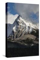 Canada, Alberta. Leah Peak, with snow and clouds, Maligne Lake, Jasper National Park.-Judith Zimmerman-Stretched Canvas