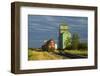 Canada, Alberta, Sexsmith. Grain elevators and train on railroad tracks.-Jaynes Gallery-Framed Photographic Print