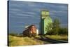 Canada, Alberta, Sexsmith. Grain elevators and train on railroad tracks.-Jaynes Gallery-Stretched Canvas