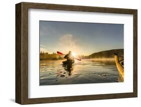 Canada, British Columbia. A kayaker paddles in morning mist on a Canadian lake.-Gary Luhm-Framed Photographic Print