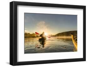 Canada, British Columbia. A kayaker paddles in morning mist on a Canadian lake.-Gary Luhm-Framed Photographic Print