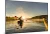 Canada, British Columbia. A kayaker paddles in morning mist on a Canadian lake.-Gary Luhm-Mounted Photographic Print