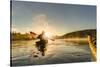 Canada, British Columbia. A kayaker paddles in morning mist on a Canadian lake.-Gary Luhm-Stretched Canvas