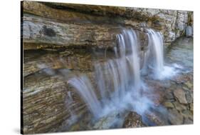 Canada, British Columbia, East Kootenay Mountains. Waterfall pouring out of limestone.-Jaynes Gallery-Stretched Canvas