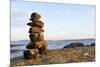 Canada, British Columbia, Russell Island. Rock Inukshuk in front of Salt Spring Island.-Kevin Oke-Mounted Premium Photographic Print