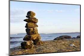Canada, British Columbia, Russell Island. Rock Inukshuk in front of Salt Spring Island.-Kevin Oke-Mounted Photographic Print