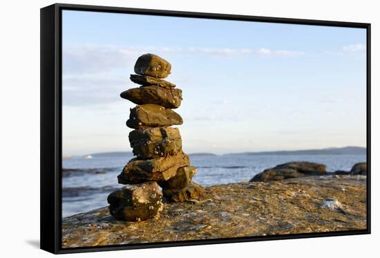 Canada, British Columbia, Russell Island. Rock Inukshuk in front of Salt Spring Island.-Kevin Oke-Framed Stretched Canvas