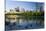 Canada Geese Resting at a Lake with Skyline, Calgary, Alberta, Canada-Peter Adams-Stretched Canvas