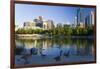 Canada Geese Resting at a Lake with Skyline, Calgary, Alberta, Canada-Peter Adams-Framed Photographic Print