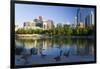 Canada Geese Resting at a Lake with Skyline, Calgary, Alberta, Canada-Peter Adams-Framed Photographic Print