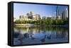 Canada Geese Resting at a Lake with Skyline, Calgary, Alberta, Canada-Peter Adams-Framed Stretched Canvas
