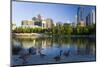 Canada Geese Resting at a Lake with Skyline, Calgary, Alberta, Canada-Peter Adams-Mounted Photographic Print