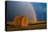 Canada, Manitoba. Double rainbow and hay bale after prairie storm.-Jaynes Gallery-Stretched Canvas