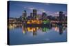 Canada, Montreal, Skyline and Old Port Along St. Lawrence River, Dusk-Walter Bibikow-Stretched Canvas