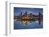 Canada, Montreal, Skyline and Old Port Along St. Lawrence River, Dusk-Walter Bibikow-Framed Photographic Print