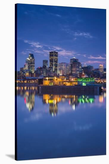 Canada, Montreal, Skyline and Old Port Along St. Lawrence River, Dusk-Walter Bibikow-Stretched Canvas