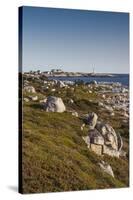 Canada, Nova Scotia, Peggy's Cove. Fishing village and lighthouse.-Walter Bibikow-Stretched Canvas