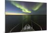 Canada, Nunavut, Aurora Borealis Glows in Night Sky Above Hudson Bay-Paul Souders-Mounted Photographic Print