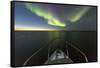 Canada, Nunavut, Aurora Borealis Glows in Night Sky Above Hudson Bay-Paul Souders-Framed Stretched Canvas