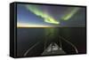 Canada, Nunavut, Aurora Borealis Glows in Night Sky Above Hudson Bay-Paul Souders-Framed Stretched Canvas