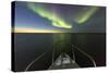 Canada, Nunavut, Aurora Borealis Glows in Night Sky Above Hudson Bay-Paul Souders-Stretched Canvas