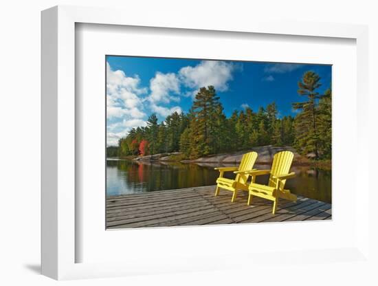 Canada, Ontario, Grundy Lake Provincial Park. Muskoka chairs on lake dock.-Jaynes Gallery-Framed Photographic Print