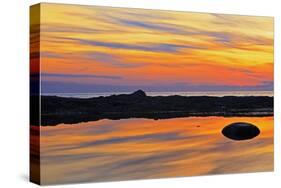 Canada, Quebec, Gulf of St. Lawrence. Reflection on water at sunset.-Mike Grandmaison-Stretched Canvas