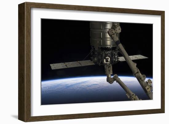 Canadarm2 Robotic Arm Prepares to Release the Cygnus Spacecraft-null-Framed Photographic Print