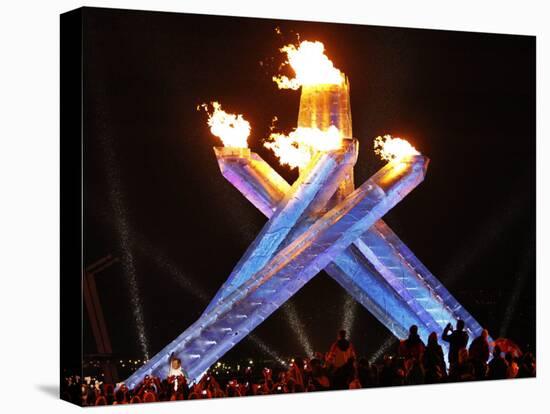 Canadian Ice Hockey Legend Wayne Gretzky as He Lights the Olympic Flame at the 2010 Winter Games-null-Stretched Canvas