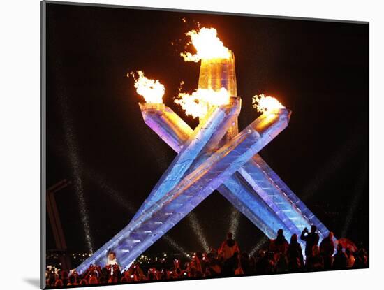 Canadian Ice Hockey Legend Wayne Gretzky as He Lights the Olympic Flame at the 2010 Winter Games-null-Mounted Photographic Print